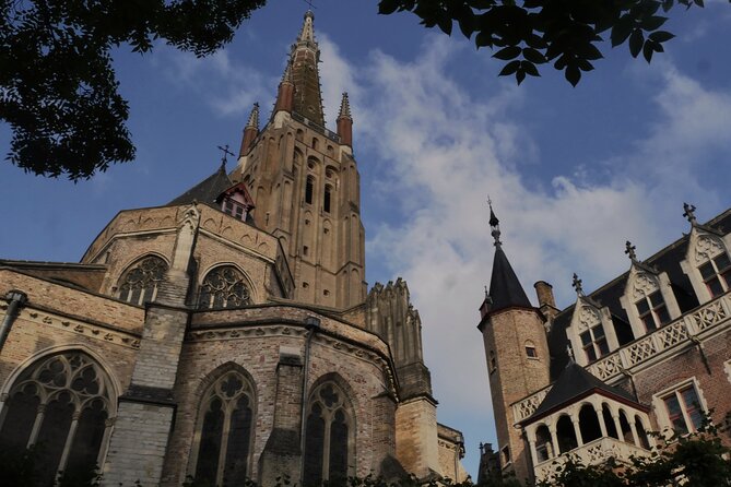Across Bruges History Equals Fun with chocolate and waffle sample - Leather Market era at Huidenvettersplein