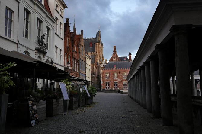 Across Bruges History Equals Fun with chocolate and waffle sample - Bridges, statues, and photo moments that feel intentional