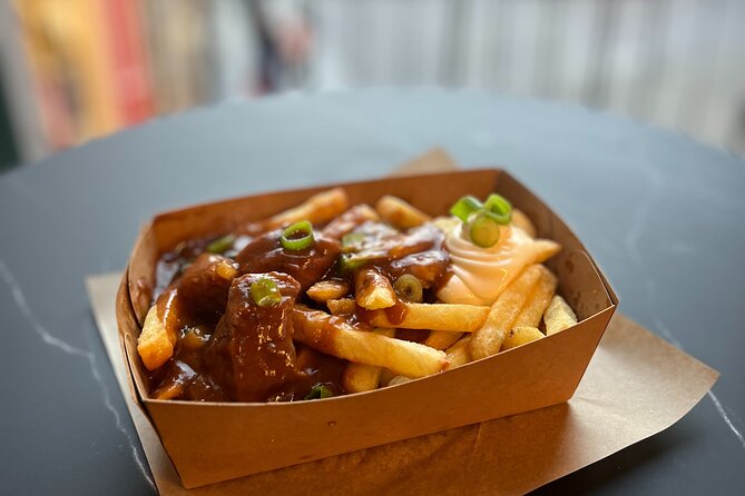Bruges Food Tour with Full Meal & Drinks by Do Eat Better - Belfort area: classic Flemish beef stew and Belgian fries