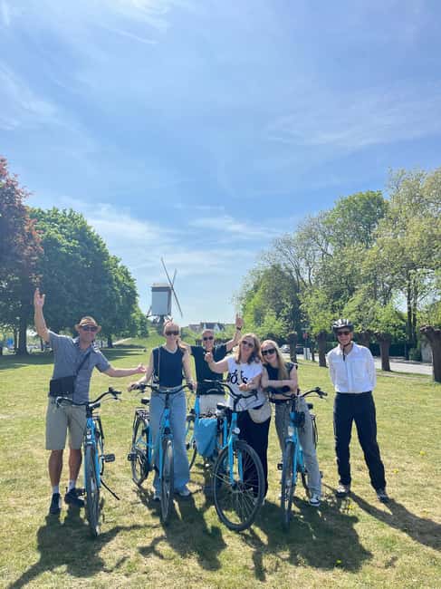 Bruges: Guided Bike Tour with a Local to Sights & Secrets - The Market Square to the Belfry stretch: seeing the center with context