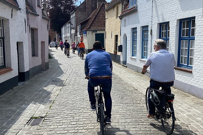 Bruges, Guided Retro Biketour: Highlights and Hidden Gems - Hof Bladelin house and the windmills: the quieter side of Bruges