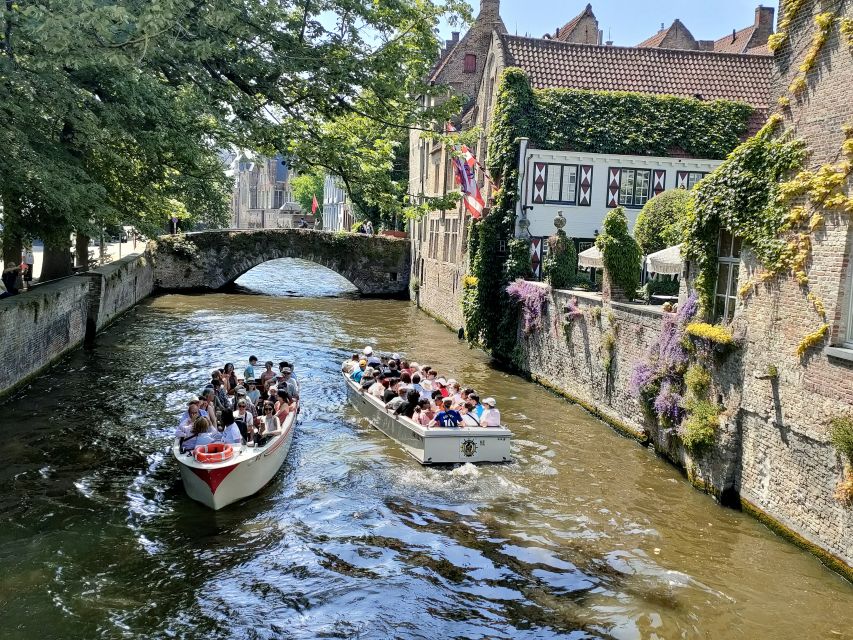 Bruges: Small Group Boat Cruise and Guided Walking Tour - Huidenvettersplein and then the change of pace to the canals