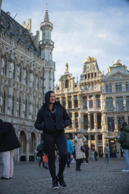 Brussels on Foot: Historic Center with a Local Guide in 2 hours - Entering Brussels through the Grand-Place Christmas “stage”