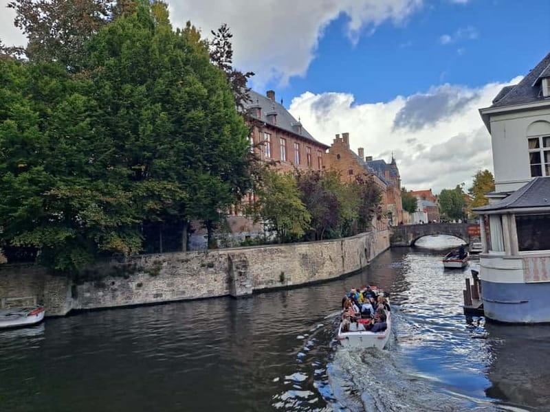 Day trip to Bruges from Paris with canal cruise - From Paris pickup to four hours of smooth minivan time