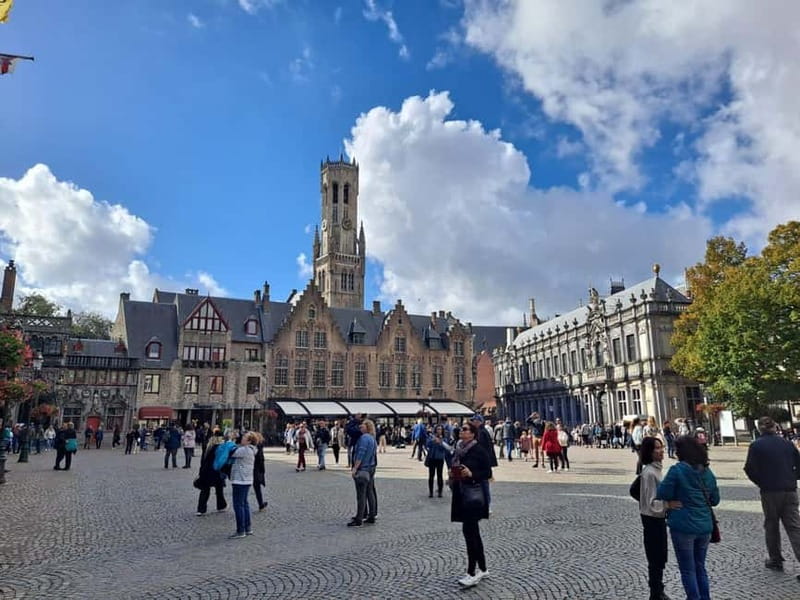 Day trip to Bruges from Paris with canal cruise - Burg Square, Belfry views, and why these places matter