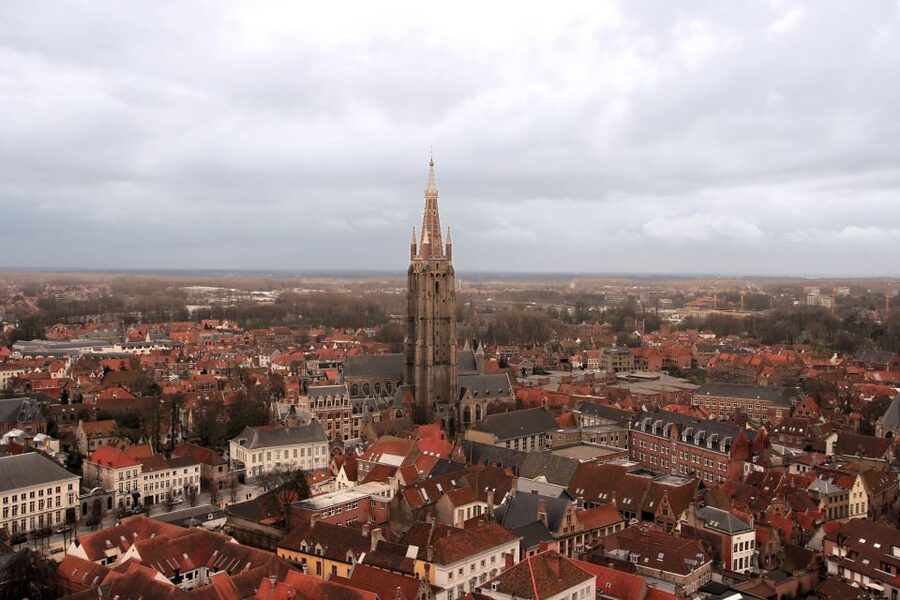From Amsterdam: Bruges Day Trip in English with Boat Option - Meeting Aloha Bowling and settling into the day
