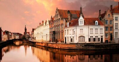 From Amsterdam: Bruges Day Trip in Spanish with Boat Option
