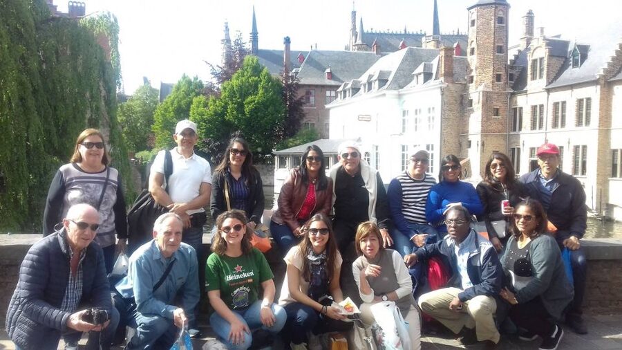 From Amsterdam: Day Trip to Bruges in Spanish or English - Brug Square and Town Hall: More Than a Pretty Backdrop