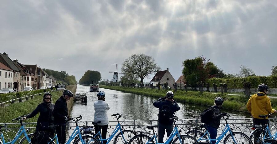 From Bruges: Family-Friendly Countryside Guided Bike Tour - Leaving Bruges: flatlands cycling, fields, and Belgian cows