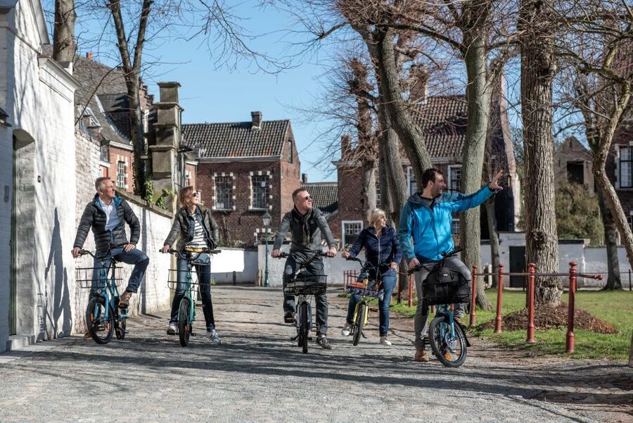 Ghent: City Highlights and Hidden Gems Guided Bike Tour - Bikes, Raincoats, and the Ride Pace That Feels Doable