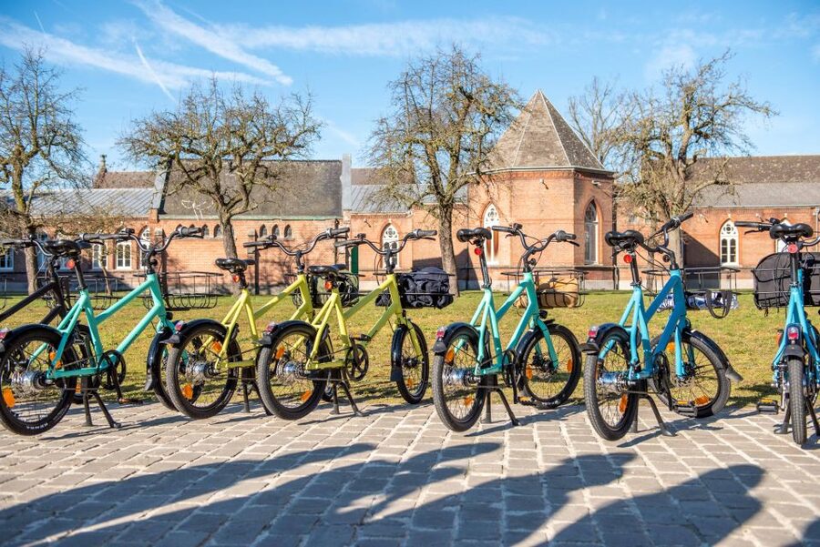 Ghent: City Highlights and Hidden Gems Guided Bike Tour - Portus Ganda and Canals: The City’s Working Heart