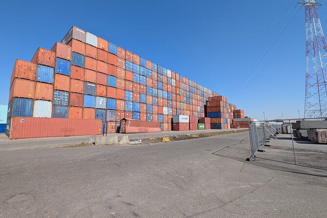 Guided Antwerp Port Tour, in your Car or Minibus - Scheldelaan duality: petro-chem stacks, steam, and a graffiti wall