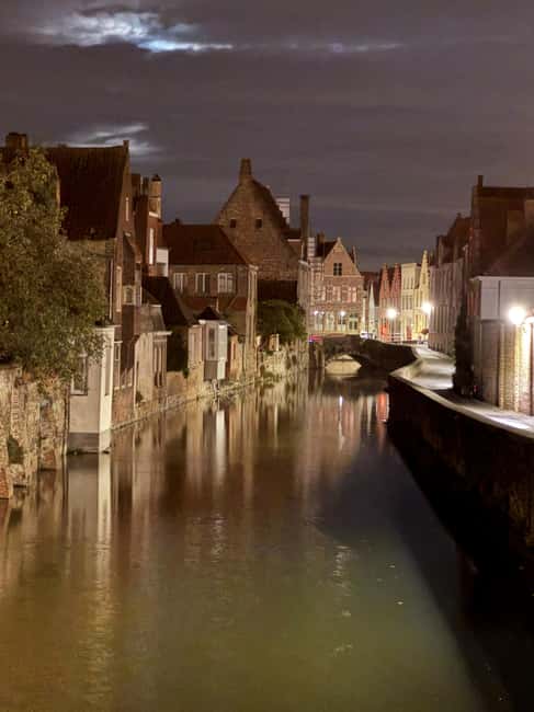 Haunted Bruges Walking Tour - Entering the Market Square: Belfort Tower and Black Plague echoes
