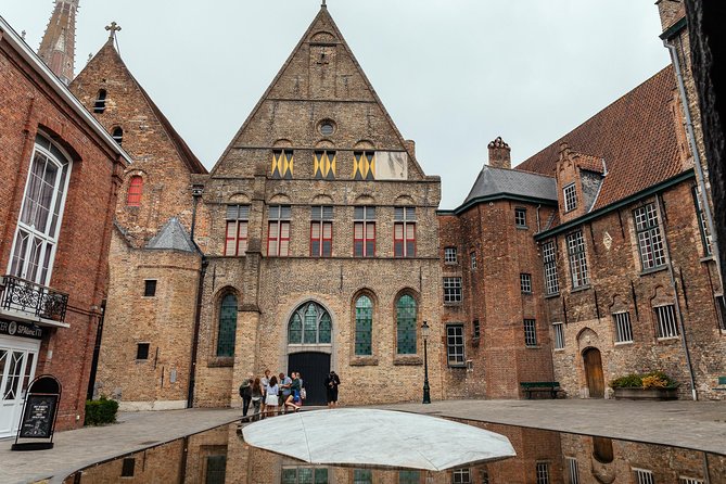 Highlights & Hidden Gems With Locals: Best of Bruges Private Tour - Markt and Burg Square: the trade engine and the fortress core