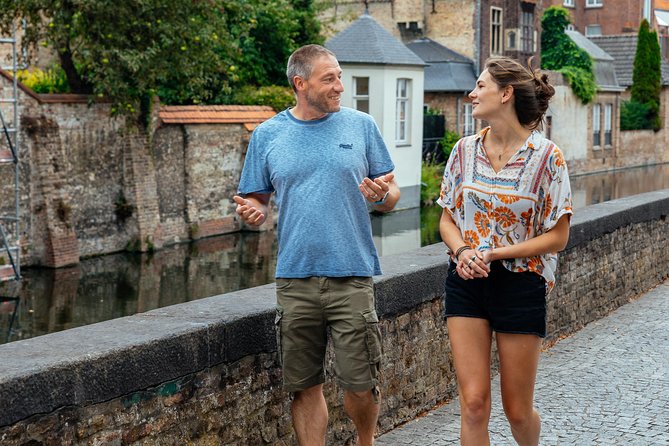 Highlights & Hidden Gems With Locals: Best of Bruges Private Tour - Oldest bridge, quirky history, and canal streets that feel quieter