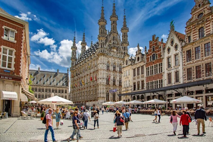 Historical Leuven: Private Walking Tour with a Local Guide - Where it all starts: Station Leuven and the Peace Monument meeting point